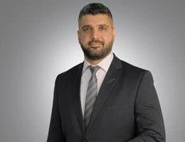 Agent: Larry Rafic Karim