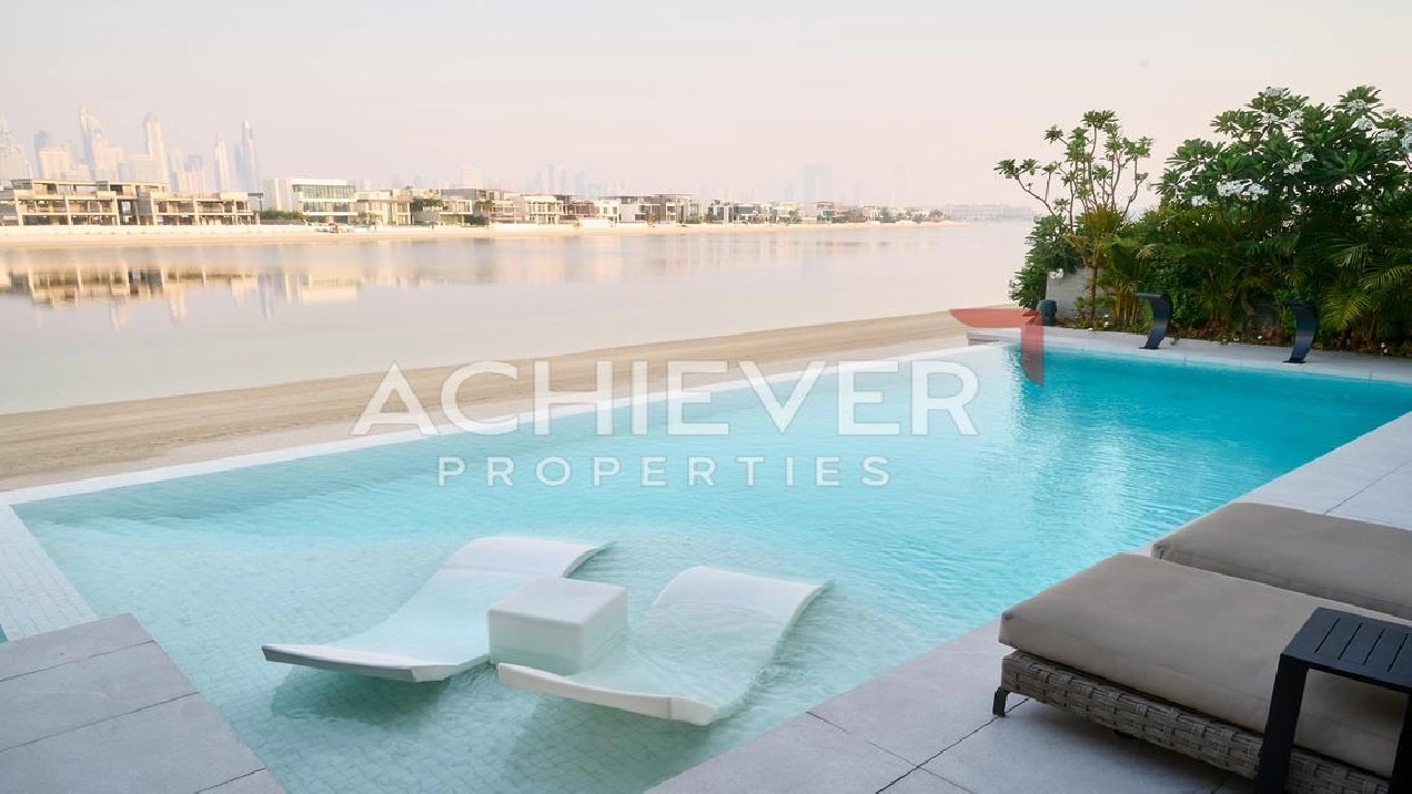 Beachfront Living | Fully Upgraded and Furnished Image# 1