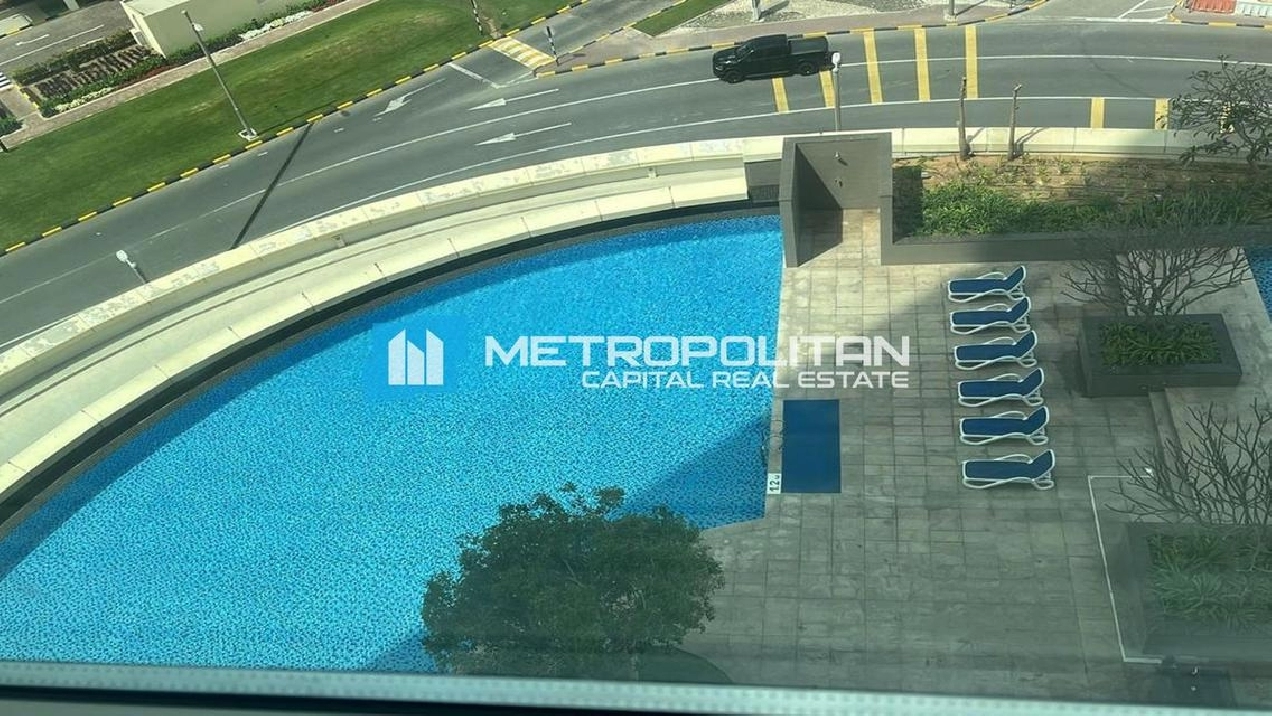 Pool And Canal View | 1BR w/ Balcony | Unfurnished