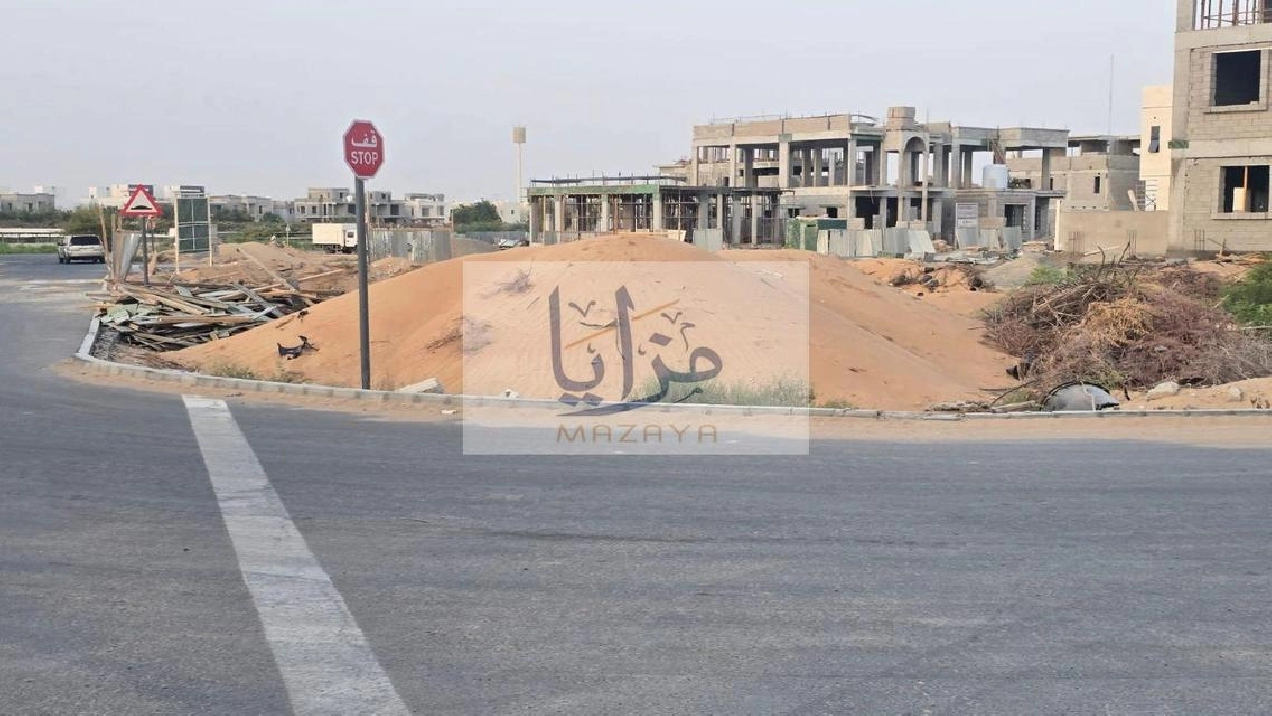 Large corner plot of land opposite Al Safir Market Pictures